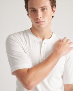 Upgrade your wardrobe basics with our Cotton Modal Short Sleeve Henley Tee. This super-soft blend of cotton and modal is incredibly lightweight and breathable, and the classic henley silhouette makes this shirt perfect on its own or as a base layer. Meet your new favorite elevated wardrobe staple.  | Quince | Men's Cotton Modal Short Sleeve Henley T-Shirt in White, Size Small, Cotton/Modal Classic Cotton Henley For Spring, Casual White Henley For Summer, Solid Henley Neckline Tops For Everyday, White Cotton Henley For Summer, Classic Everyday Top With Henley Neckline, White Crew Neck Henley For Everyday, Classic Henley Neckline Top For Layering, Classic Henley Neckline Top With Relaxed Fit, Classic Relaxed Fit Henley For Everyday