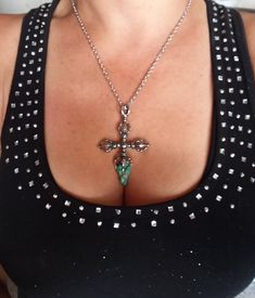 WANTED all over the Universe. Turquoise is recognized Sought After by early KINGS, MOVERS, and SHAKERS! Turquoise is said to be a vessel Imbued with energies associated with Heaven! All My Turquoise is Carefully chosen from around the World. I love the Raw Authentic look and feel of the stone...so I do not over polish the Turquoise! True Bohemian Style...an Original work of Art that you can treasure for a lifetime! Each of My Creations are One of A Kind and are Hand wrought to bring out the best in each Stone.  In each photograph I try to impart the true beauty of each stone....with the use of natural sunshine the rich colors and depth of character is displayed for love of Turquoise and all its glory 🎁 My Creations are meant for the True Turquoise lover like myself 100% Guaranteed! Custom Bohemian Turquoise Cross Jewelry, Handmade Turquoise Cross Necklace, Bohemian Cross Jewelry For Festival, Turquoise Accessories, Bohemian Cowgirl, Bead Choker, Turquoise Cross, Boho Style Jewelry, Rhinestone Cross