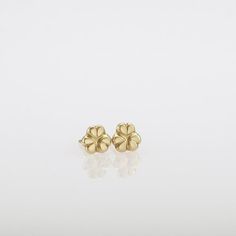 Modern flower 14k gold stud earrings handmade of 14k solid gold.These gold flower earrings are highly shiny and comfortable to wear. Unique and delicate, great as a gift as they can be enjoyed at any age and outfit.14k solid gold ear backs are included.Flower’s diameter is approx 6 mm = ~0.24 inch each* The earrings will be packed in a gift box ready to give as a gift *To see more gold earrings click here: http://www.etsy.com/shop/SigalGerson?section_id=13604349&ref=shopsection_leftnav_1To s Earrings Studs Gold, Gold Flower Earrings, Everyday Earrings Studs, Classy Earrings, Flower Ear, Dainty Studs, Flower Stud Earrings, Gold Stud Earrings, Flower Stud