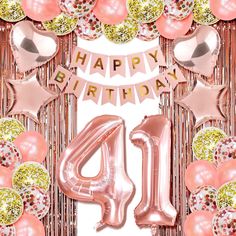 pink and gold foil balloons with the number forty on it