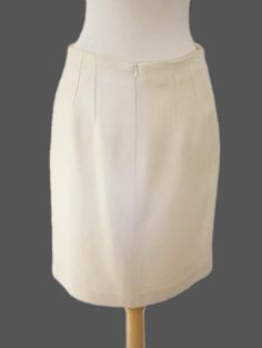 Here is a wonderful women's skirt from Kiton. As is their sartorial tradition, each Kiton garment is handmade in their factory in Naples, Italy and features the finest hand stitching throughout, and of course their exclusive fabrics are among the most luxurious in the world! DETAILS: Color: Cream Size Tagged: IT 44 Fabric: 100% Silk Weight: Spring/Summer/Fall Lining: Yes Made in: Italy MEASUREMENTS: Waist: 30" Hips across: 19" Length: 20" Naples Italy, Cream Silk, Naples, Autumn Summer, Summer Fall, Hand Stitching, Women's Skirt, Womens Skirt, Stitching