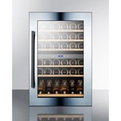 a wine cooler with many bottles in it