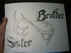 a hand holding up a book with the words brother and sister written in black ink