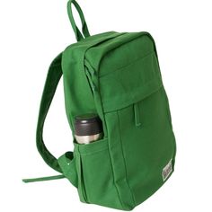 Need a backpack that's both sustainable and practical for everyday use, outdoor activities, or college? Our Earth Backpack is perfect for you. It's spacious, durable, and made of natural fiber. Approximately 16L capacity. Made with 14-oz Certified Fairtrade Organic cotton canvas. Made in a Fair Trade Certified™ Factory. Casual Cotton Backpack For Daily Use, Casual Cotton Backpack For Everyday, Casual Cotton Backpack For Everyday Use, Casual Green Canvas Backpack, Casual Green Rectangular Backpack, Green Cotton Backpack For Back To School, Everyday Green Cotton Backpack, Green Backpack For Everyday Use And Back To School, Cotton Backpack For Everyday Use And Back To School