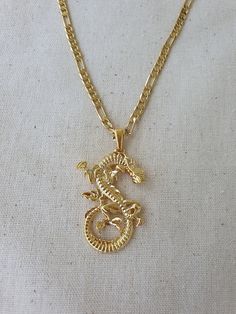 Handmade 18k Gold Plated Dragon Necklace Made with love in İstanbul.. Delivery time: max 15 days.. Golden Dragon Necklace, Gold Snake-shaped 14k Gold Necklace, Gold Snake Shape 14k Gold Necklace, Personalized Gold Snake Chain Jewelry, Snake Shape Clavicle Chain Jewelry As A Gift, Figaro Chain Jewelry With Round Pendant As Gift, Yellow Gold Snake-shaped Necklace For Gift, Yellow Gold Snake Shape Necklace Gift, Snake-shaped Yellow Gold Jewelry For Gifts