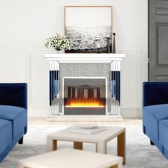 a living room with two blue couches and a fire place in the middle of the room