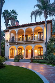 Mediterranean-style mansion with arched balconies and palm trees. Embark on a whirlwind tour of luxurious abodes where opulence meets whimsy, leaving you green with envy and ideas for your next home upgrade.