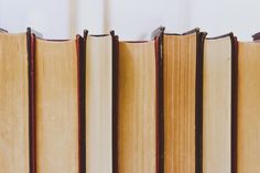 several books lined up on top of each other