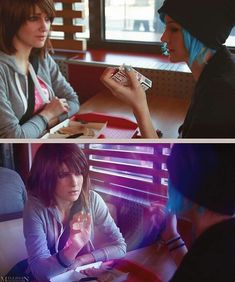 two women are sitting at a table and one is eating