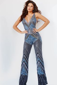 Jovani 23736 Spring 2023 evening collection dress. This luxurious dress is perfect for a black-tie event or red carpet entrance. It features an off-the-shoulder design with intricate beadwork and tulle skirt. Sequins Jumpsuit, Plus Size Sequin Dresses, Modest Formal Dresses, Luxurious Dress, Light Blue Prom Dress, Navy Blue Bridesmaid Dresses, Intricate Beading, Plus Size Summer Dresses, Blue Sequin Dress