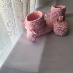 Knitted baby booties - 0-6 month ,pink It is made out of 100% acrylic yarn.  Made in a pet and smoke free home.  Perfect for a baby shower gift, birth announcement, or that precious newborn in your life. They are very soft and will keep your baby's feet warm and cozy. CARE INSTRUCTIONS: Machine wash using the gentle cycle or handwash with cold water. Do not bleach. Be sure to tumble dry using very low heat only and do not over dry. Cute Pink Booties For First Birthday, Cute Pink First Birthday Booties, Cute Pink Booties With Soft Sole, Cute Soft Sole Booties As Gift, Pink Booties With Soft Sole For Gift, Pink Booties With Soft Sole As Gift, Pink Round Toe Booties For First Birthday, Cute Yarn Booties As A Gift, Cute Yarn Booties As Gift