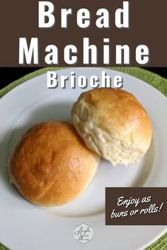 two rolls on a white plate with the words bread machine brioche below it