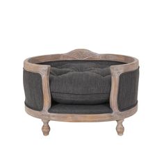 the round chair is made out of wood and fabric