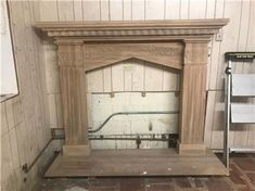 an old fireplace is being worked on