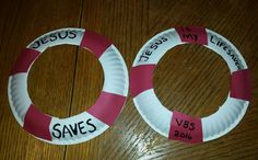 two paper plates that say jesus and save's on the front one has a life preserver