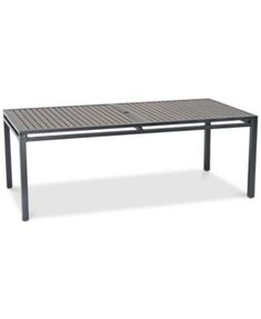 an outdoor table with metal slats on it