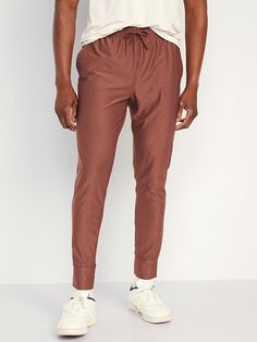 Slim KnitTech Pants | Old Navy Fall Bottoms With Elastic Waistband, Functional Fall Bottoms With Elastic Waistband, Casual Jogging Pants With Hip Pockets, Comfort Stretch Bottoms With Pockets For Gym, Comfort Stretch Gym Bottoms With Pockets, 4-way Stretch Sweatpants With Pockets For Jogging, Sporty Brown Pants For Gym, Sporty Brown Sports Pants, Functional Sports Bottoms For Fall