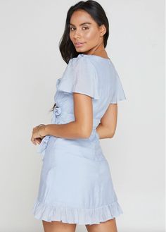 The most delicate blue mini dress. Runs true to size. This will look lovely on you! Model is wearing size small.