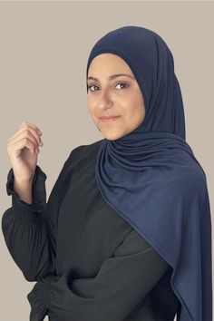 Our Modish Girl-Instant Hijabs are a must have! They are custom made for petite young girls. They are pre-sewn to easily slip on & wrap effortlessly. The Modish Girl Instant Premium Jersey hijab-Navy was designed to be a head wrap that is ready in seconds. Simply pull over your head and adjust your hijab into place. It’s that simple!!! No pins required. Made from a high quality jersey fabric that feels cooling and breathable for ultimate comfort all day long. Our goal was to create the most vers Fitted Modest Solid Hijab, Solid Stretch Khimar, Jersey Hijab, Hijab Girl, Head Wrap, Head Wraps, Your Head, Jersey Fabric, Custom Made