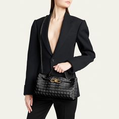 Bottega Veneta "Andiamo" top handle bag in  intreccio  lambskin leather  Rolled top handle, 3.0" drop Shoulder strap Can be worn as a top handle or shoulder bag  Open top with magnetic closure; metal knot center strap  Approx. 7.0"H x 11.4"W x 3.9"D Made in Italy Luxury Handheld Shoulder Bag With Dust Bag, Luxury Shoulder Bag With Top Handle For Shopping, Office Shoulder Bag With Double Handle And Dust Bag, Luxury Shoulder Bag With Top Carry Handle For Shopping, Luxury Box Shoulder Bag With Handles, Luxury Office Crossbody Bag, Luxury Handheld Box Bag With Removable Pouch, Luxury Handheld Bag With Top Carry Handle, Luxury Tote Box Bag With Removable Pouch