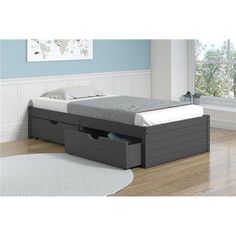 an image of a bed with two drawers in the bottom and one drawer on top