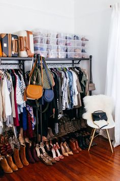 an organized closet with shoes and handbags