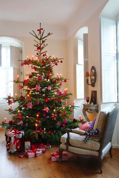 a decorated christmas tree in a living room