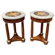 pair of marble and wood side tables with star design on each end, circa 1950's