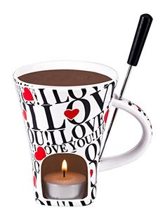 a coffee mug with a candle inside and i love you in the middle, on a white background