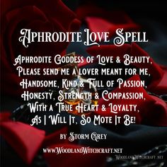 a red rose sitting on top of a black cloth with the words, aphrodite love spell