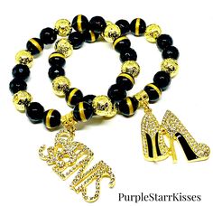 Louisiana Beaded Charm Bracelet Saints Charm Bracelet  12mm Black w/Gold Stripe Beads Agate  12mm  Black Beads  12mm Gold Lava Beads 1 - Saints Charm 1-  Stilleto Heel Charm Adjustable Black Team Spirit Jewelry, New Orleans Saints Beaded Bracelets, Black Charm Bracelet With 8mm Beads, Spiritual Yellow Hand-strung Beaded Bracelets, Mardi Gras Bracelet, Lava Bead, Bead Charm Bracelet, Gold Stripes, Black Beads