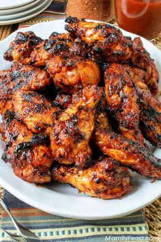 grilled chicken wings on a white plate