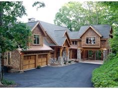 this is an image of a large house in the woods