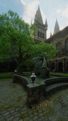 an old building with a fountain in front of it