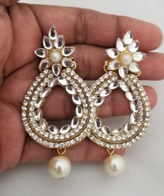 MK Fashionkart - Handmade Jewelry Indian Fashion Jewelry Partywear white Stone Earrings with pearl hanging Suitable for Saree/Salwar/party wear dresses Free Shipping SHIPPING : Ready to ship in 1 business day. This item will be shipped from The United States. Jewelry care instructions : 1. Please wipe the jewelry with a piece of cotton cloth after usage. 2. Store the jewelry in a cool, dry and air tight box or pouch. 3. Make sure the jewelry is away from direct heat and water. 4. Please wipe of Elegant White Danglers With Stone Work, White Stone Work Earrings For Gift, White Earrings With Stone Work For Gift, White Bridal Earrings With Stone Work For Celebration, White Jhumkas With Stone Work For Gift, White Stone Work Jhumkas For Gift, Gift White Stone Work Jhumkas, White Stone Work Jhumkas As Gift, White Pearl Chandbalis