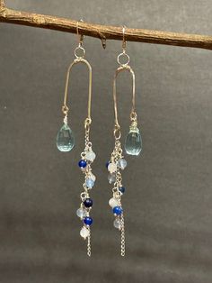 Artisan designed and handmade Aquamarine Mixed Cascading Gemstone Earrings.  Total measurement length 4 inches long including sterling silver lever backs earring wire, width 1 inch wide and drop length 2 1/2 inches long. Gemstone Earrings Dangle, Earring Wire, Artisan Design, Measurement Length, Gemstone Earrings, Aquamarine, Jewelry Earrings Dangle, 1 Inch, Etsy Earrings