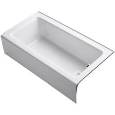 the bathtub is white and has a long, rectangular tub with an extended drain