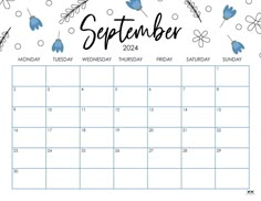 a calendar with blue flowers on it and the word september in black ink, is shown