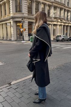 Fashion Jackson Wearing Toteme Embroidered wool and cashmere scarf Toteme Black Double Breasted Wool Coat AGOLDE Kelly Jeans Toteme Black Leather Boots Bottega Veneta Teen Jodie Black Handbag new york outfits for winter soho street style 1 Street Style Boots, Fall Outfit With Boots