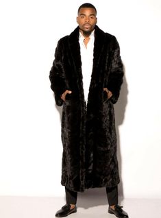 THIS MINK FUR COAT IS OUR #1 BESTSELLER FOR MEN! This full length mink fur coat is masculine, elegant, and warm! It's the perfect fur coat for any man searching for the best coat that's versatile enough to wear with slacks or jeans, or over your best tux! It has been handcrafted in a sculptured pattern and accentuated with a shawl collar. It has been dyed in your choice of ranch, mahogany, or demi buff. Dye added Fur Origin: Denmark Made in Greece Stock # : 193162 Length : 54 inches Dye added Mu Luxury Long Fur Coat With Faux Fur Lining, Luxury Long Coat With Faux Fur Lining, Luxury Long Fur Coat, Luxury Formal Fur Coat With Faux Fur Lining, Luxury Long Fur Coat For Formal Occasions, Luxury Long Formal Fur Coat, Luxury Mink Color Long Fur Coat, Luxury Long Mink Coat, Luxury Mink Long Coat