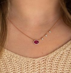 *Necklace currently available via special order, please contact us to order. Isn't she lovely 😊...we think so! A delicious red ruby necklace with the perfect amount of sparkle to bring out a warm smile. The necklace is fully adjustable which allows for easy positioning anywhere along the neckline. Crafted in 14k rose gold 0.73 ct. oval ruby 0.24 cttw. diamond accents 18" chain length Ruby Chain With Pendant, Ruby Jewelry Necklaces Indian, Ruby Jewelry Necklaces Gold, Red Ruby Necklace, Ruby Necklace Designs, Delicate Diamond Necklace, Small Gold Necklace, Ruby Chain, Ruby Diamond Necklace