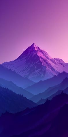 a mountain covered in purple and blue haze