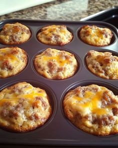 muffins with cheese and meat in a pan