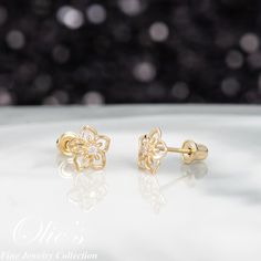 This elegant flower stud earrings will make a perfect gift for mom. Fashion in 14k gold, this detailed floral earring features a round-cut CZ at the center, and is secured with screw backs or push backs. *Product Details* Material: 14K Gold Metal Color: Yellow Gold Earring Size: Length (6.25mm), Width (6.25mm) Stone Color: Clear CZ Stone Cut: Round Setting: Prong Stone Type: Cubic Zirconia Metal Finish: Polished Post Length: 8mm long for Screw Back and 9mm for Push Back Sold in Pair (2 earrings) Floral Earring, Mom Fashion, 2 Earrings, Spring Theme, Flower Stud Earrings, Mom Jewelry, Flower Stud, Ear Rings, Elegant Flowers