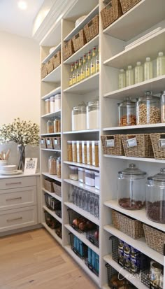 a large pantry with shelves full of food