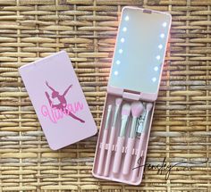 Competition season is upon us and I'm excited to add this travel makeup brush set with lighted & rotating mirror. We are the FIRST shop on Etsy to offer these and they make the perfect stocking stuffer or gift for your dancer or their friends! 💖 These sets are perfect for dancers, cheerleaders, gymnasts, hair & makeup professionals OR anyone on the go. It's the perfect size to throw in your purse, dance bag, or backpack.  BRUSHES ARE INCLUDED!  TO ORDER: ▪️In the personalization section, please list how you would like the case personalized.  Include color for the decal, if you're selecting a dancer or cheer decal. Please also include font color (will need to be different from the decal color).  There is an UPCHARGE on Glitter and GLITTER CAN NOT BE USED ON BOTH DECAL AND NAME.  If choosin Dance Gift Ideas, Cheer Team Gift, Rotating Mirror, Cheer Team Gifts, Dance Team Gifts, Travel Makeup Brushes, Purple Things, Big Little Gifts, Cheer Gifts