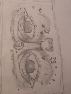 a drawing of two faces with stars and moon designs on them, one is looking at the viewer