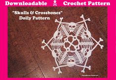 a crochet doily pattern with skulls and crossbones in the center