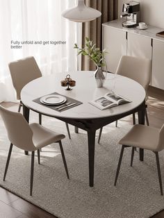 a dining room table with chairs around it