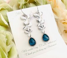 #giftforher #giftunder30 #readytoshipgift #personalizedgift #lalacrystal #bridesmaidgifts #flowergirl #jewelry #necklace #orchidnecklace #weddingnecklace #bridalgift #christmasgift #gift for her Blue Wedding Jewelry With Flower Charm, Blue Dangle Flower Earrings For Wedding, Nickel-free Blue Flower Earrings For Wedding, Silver Bridal Earrings With Flower Charm As Gift, Flower Charm Earrings For Wedding On Mother's Day, Flower Charm Earrings For Wedding And Mother's Day, Dangle Flower Earrings For Wedding On Mother's Day, Mother's Day Wedding Flower Charm Earrings, Personalized Earrings For Wedding On Mother's Day